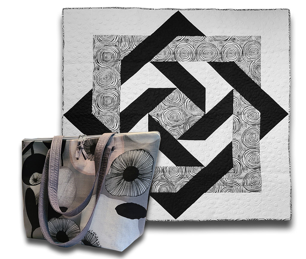 Joyce Deckard Anderson black & white geometric quilt and black & white abstract floral bag.